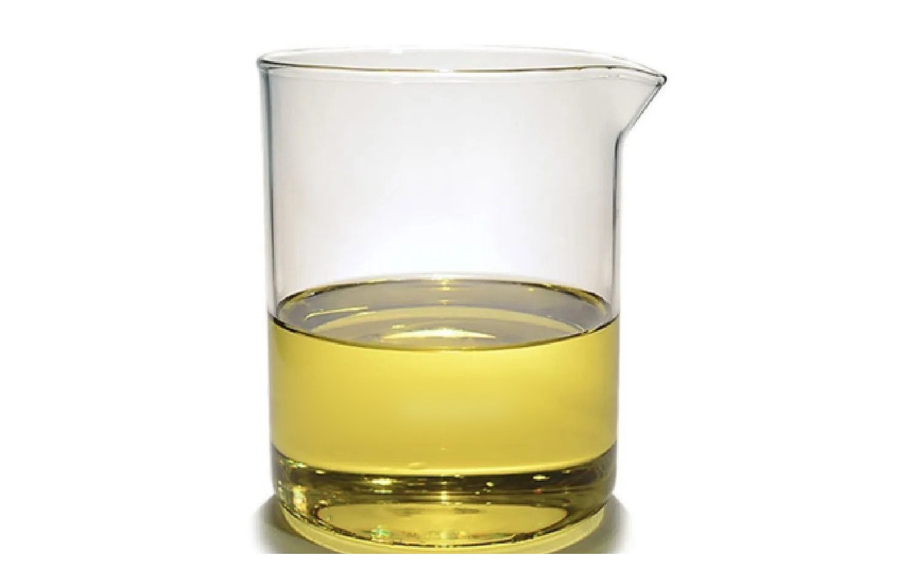 Light Diesel Oil sample in a laboratory beaker